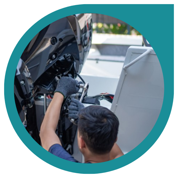 boat builder making adjustments to a motor yacht