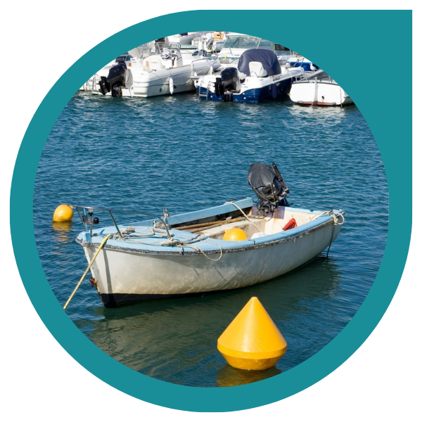 small boat moored in a marina